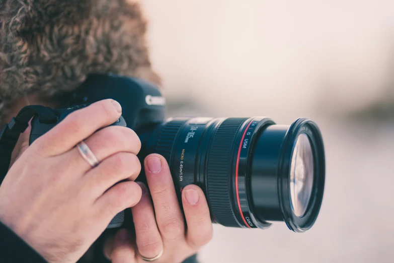 a person taking a picture with a camera