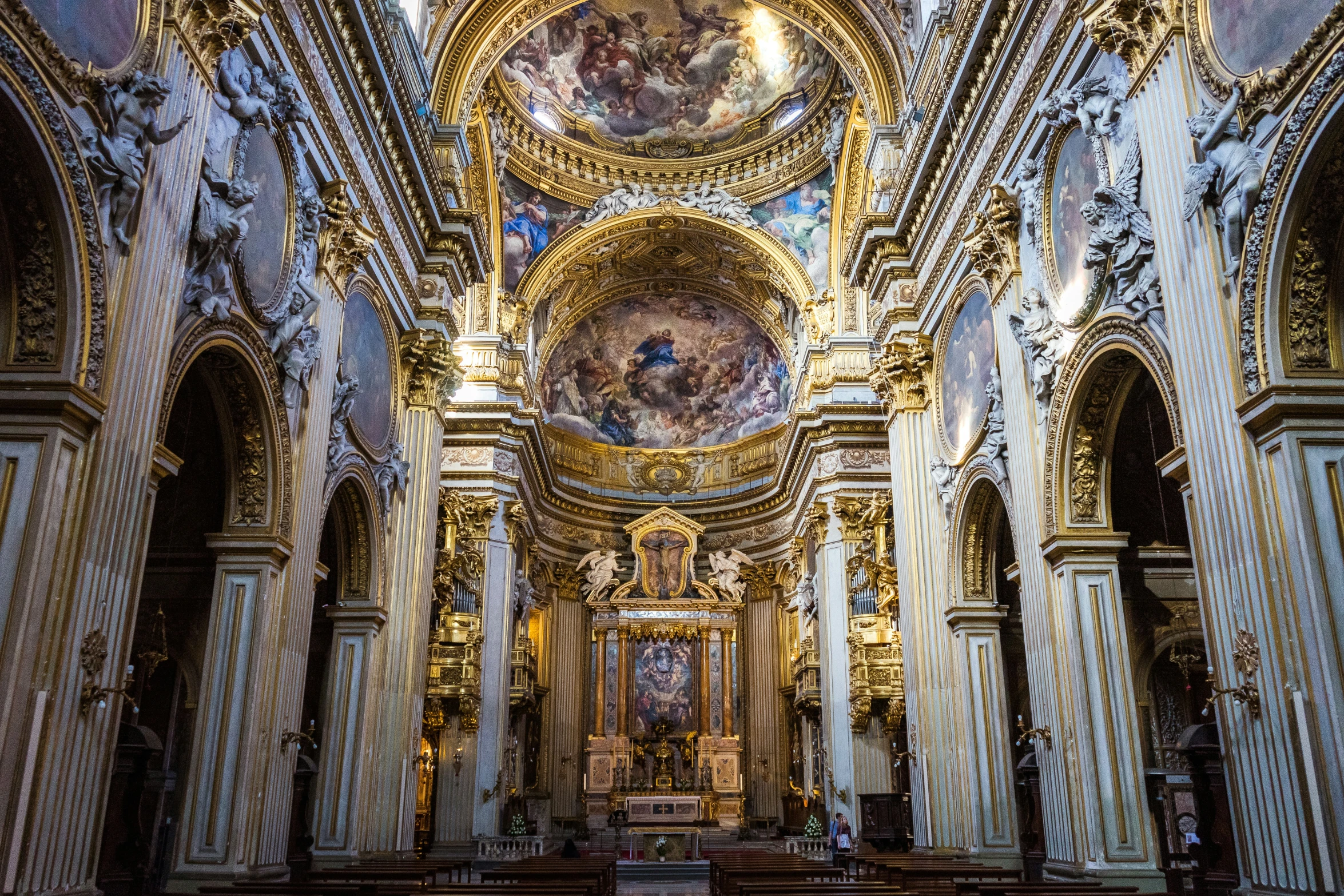 an empty cathedral with a lot of gold and marble