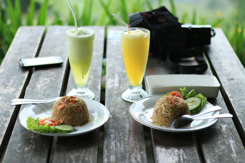 two small plates filled with food next to each other