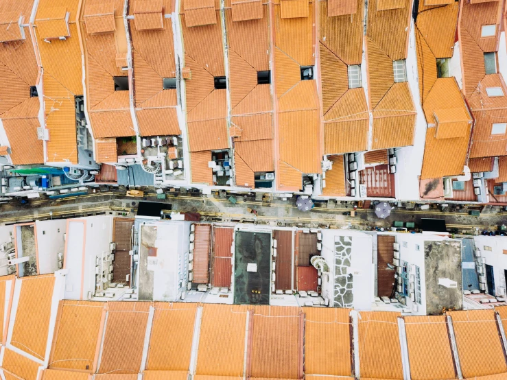 an overhead view of a city with buildings made of corrugated sheets