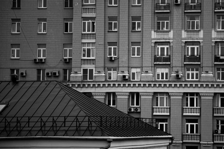 multiple windows on the side of a building