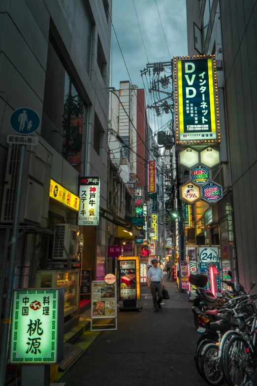 a street scene with some signs in asian language