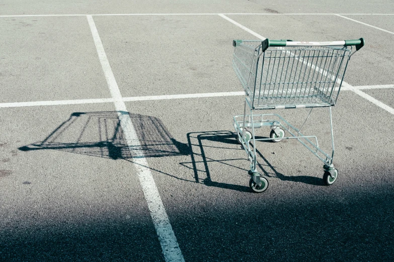 a shopping cart that has just passed the parking spot