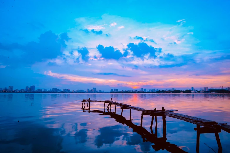 a pier sitting on top of a large body of water