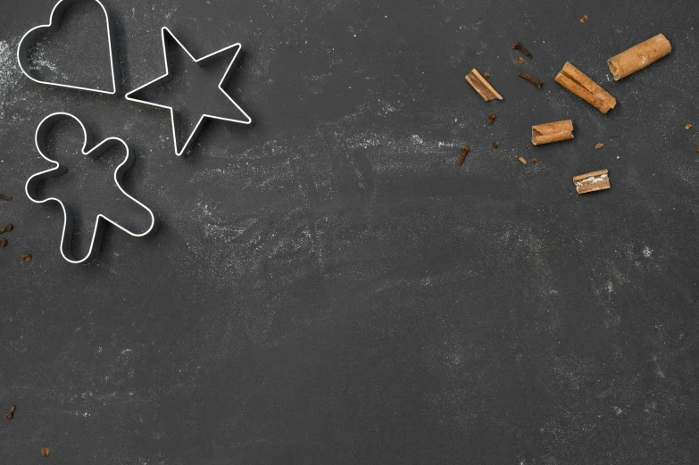 a cookie cutter sitting in the shape of stars on a table