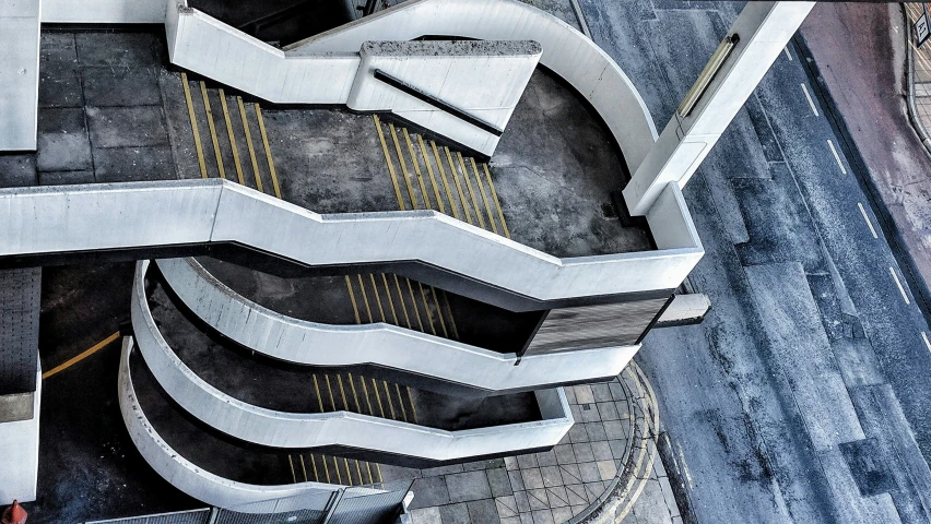 aerial view of an escalator and walkway at a building