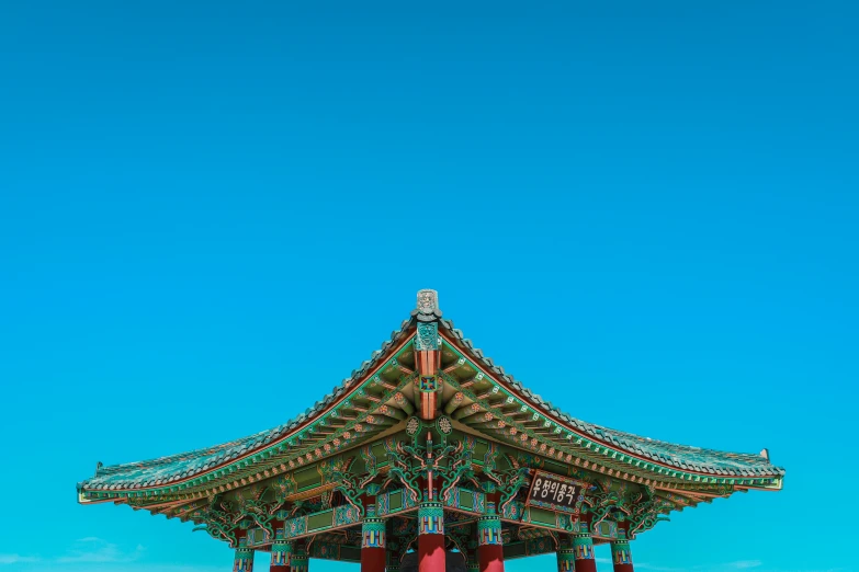 a large pavilion sitting under a blue sky