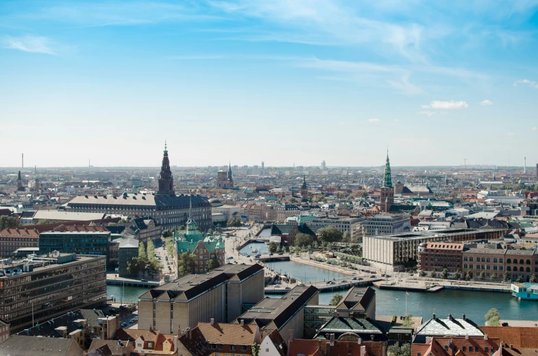 an aerial view of a city skyline with lots of buildings