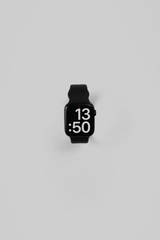 a black apple watch that is being displayed