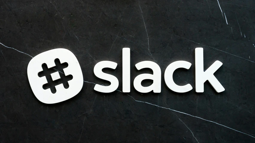 slack sign on the outside of the company
