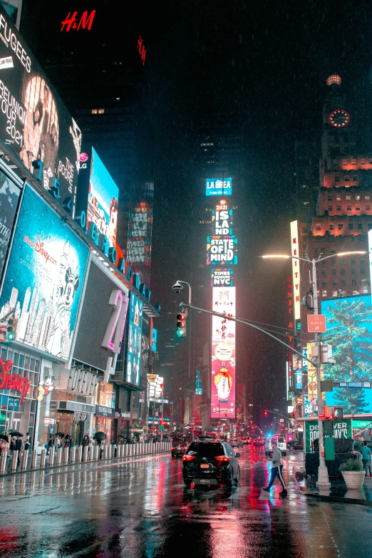 an empty city street at night in the rain