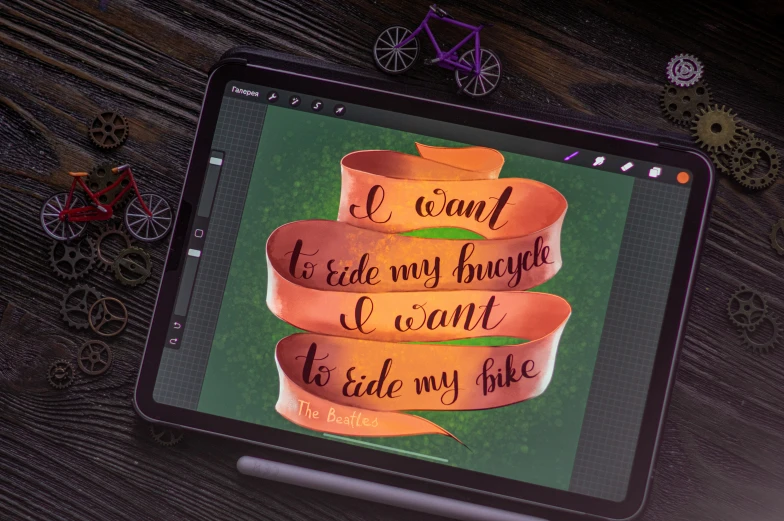 the wording is drawn on an ipad with the image of a bike