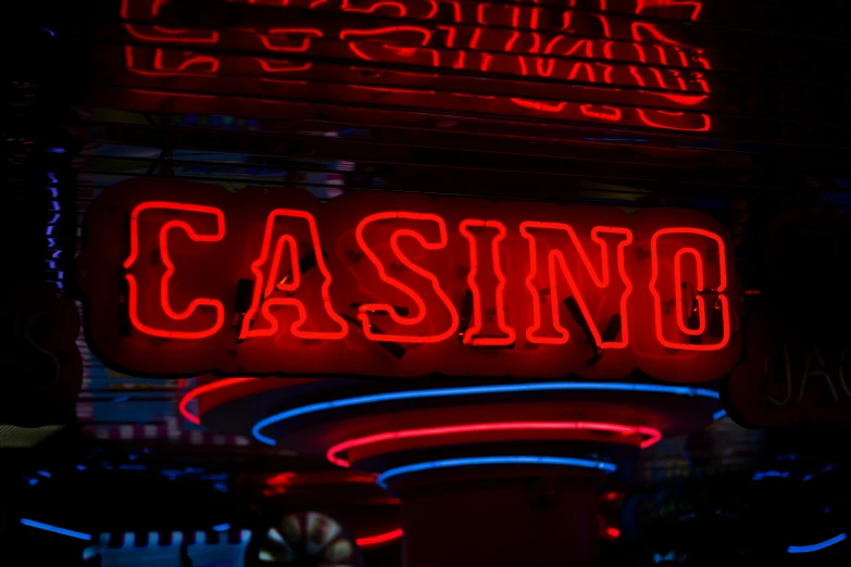 neon sign advertising casino, on building front