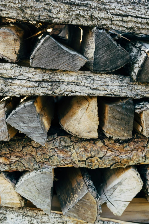 a stack of wood that is stacked up and chopped together