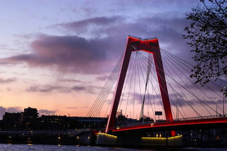 red light on the side of a bridge