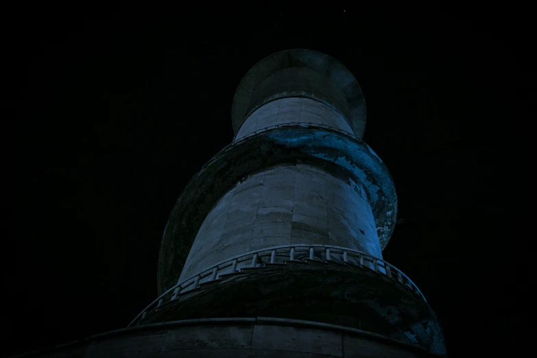 the tower in the dark has been partially lit