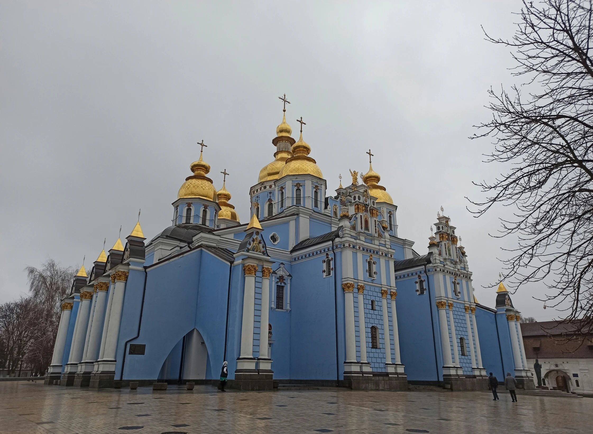 the church is blue with gold accents on it