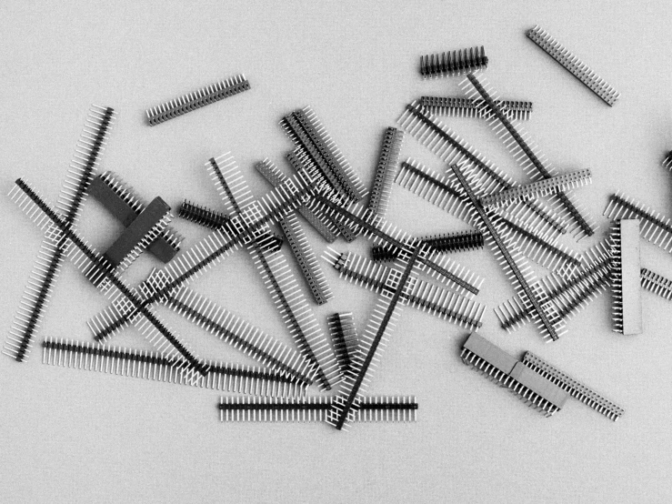 black and white image of pins and needles