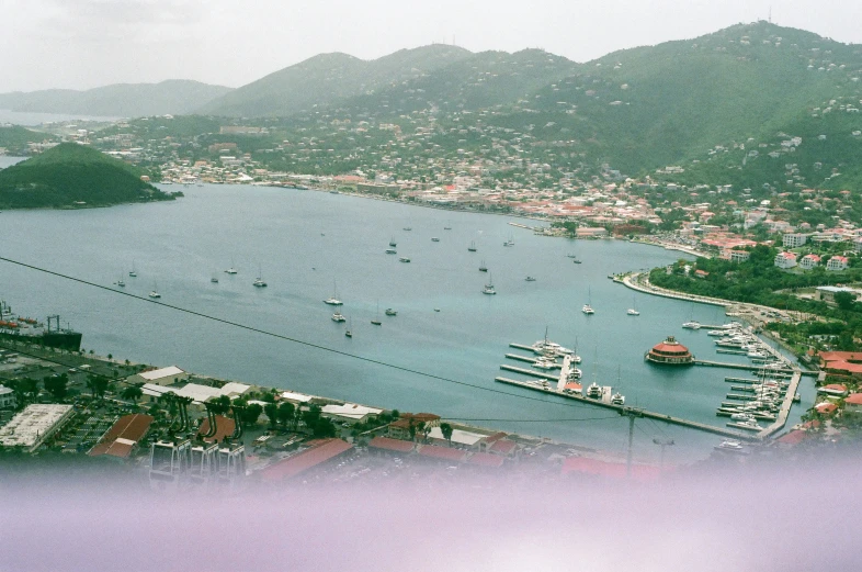 a view from a plane of many boats in a bay