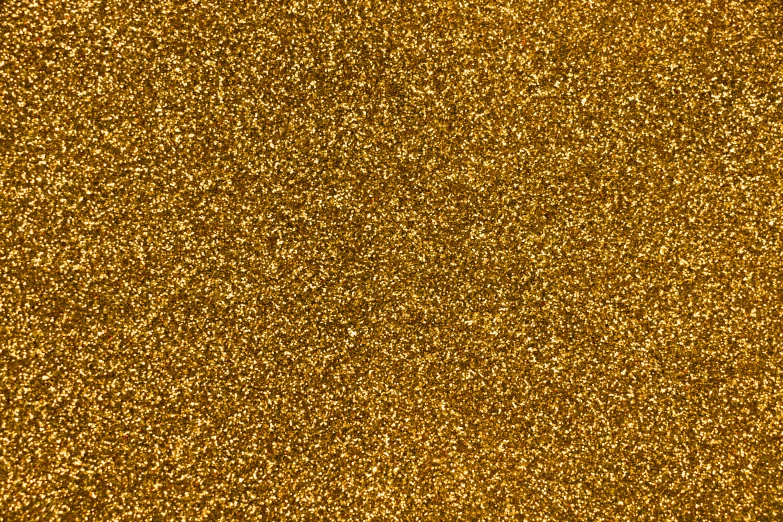 a background texture of gold glitters