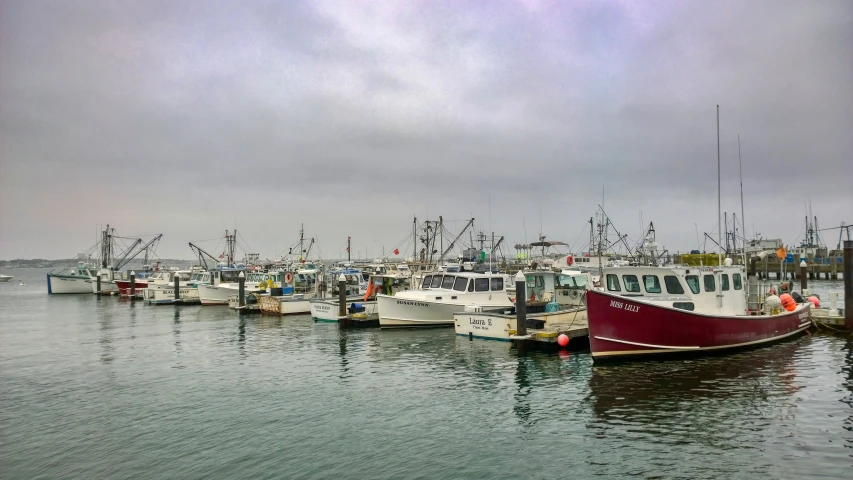 a bunch of ships that are sitting out in the water