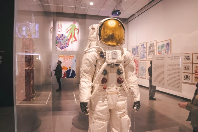 an astronaut's space suit in a gallery