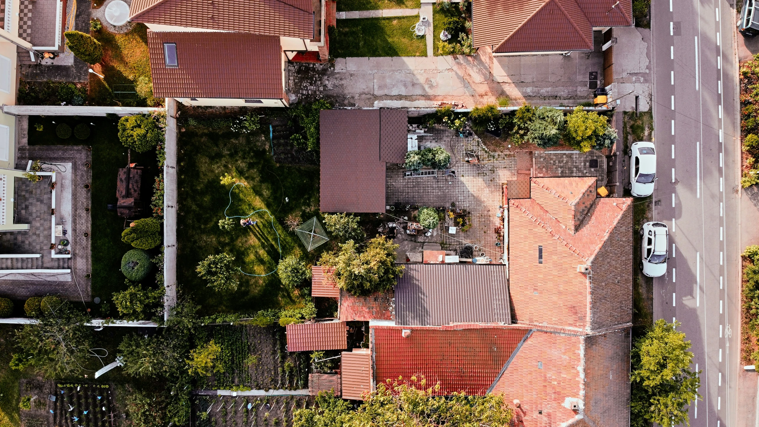 this is an aerial s of the rooftops and roofs of a suburban area