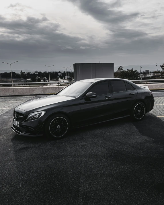 a mercedes benz parked in a parking lot