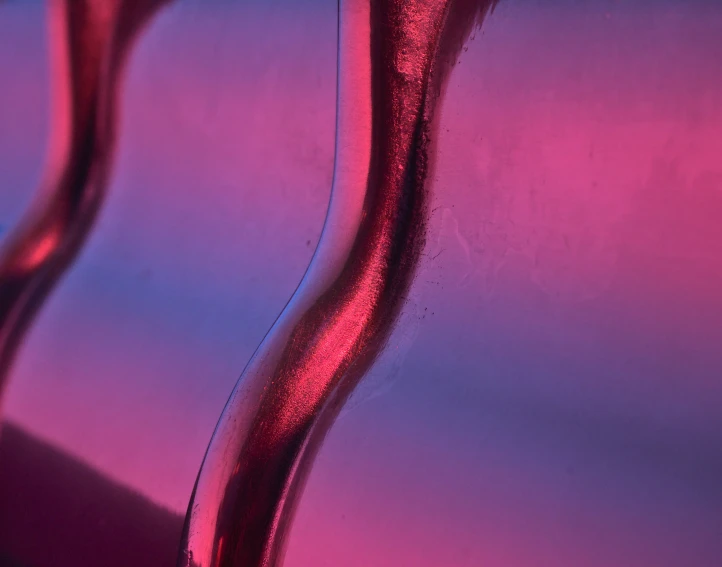 this is the handle of an item in pink and purple