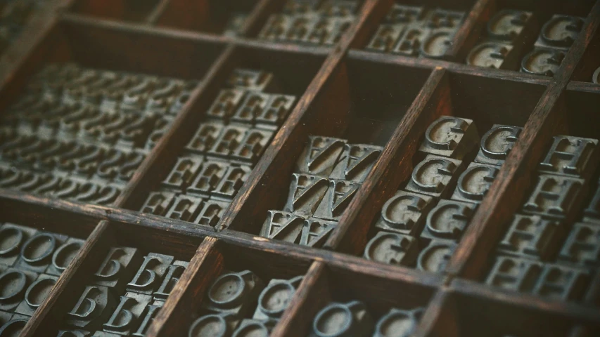 some type of metal type with letters and numbers