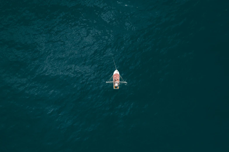 person in a canoe riding on the water
