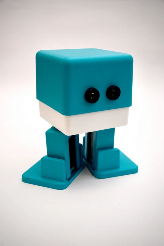small lego model of a blue robot standing upright on two legs
