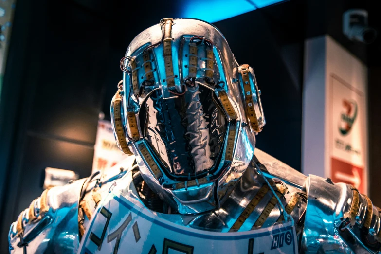 an astronaut type suit on display with other space related objects