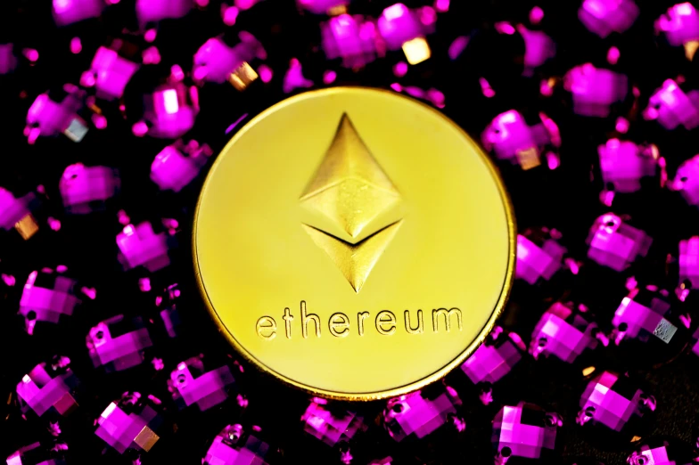 an ethereum coin surrounded by small pink squares