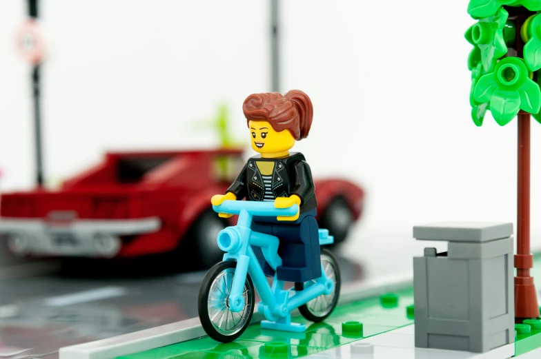 this is a picture of a toy person on a bike