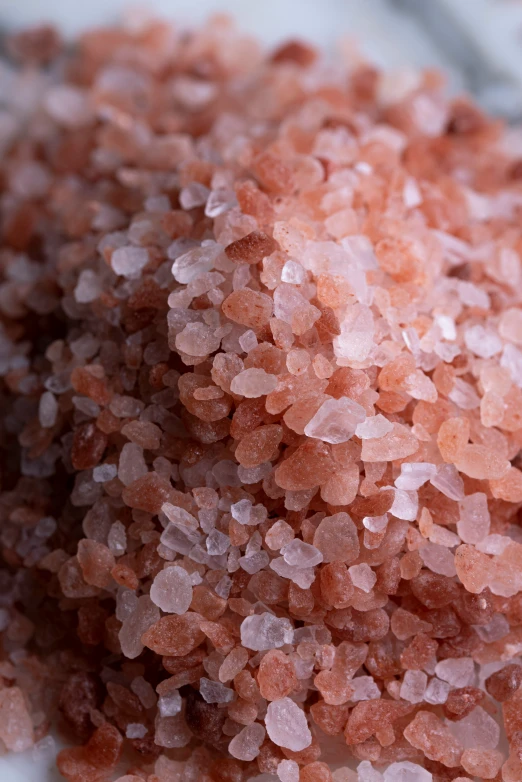 red and pink speckled sugar chips sitting on a white table