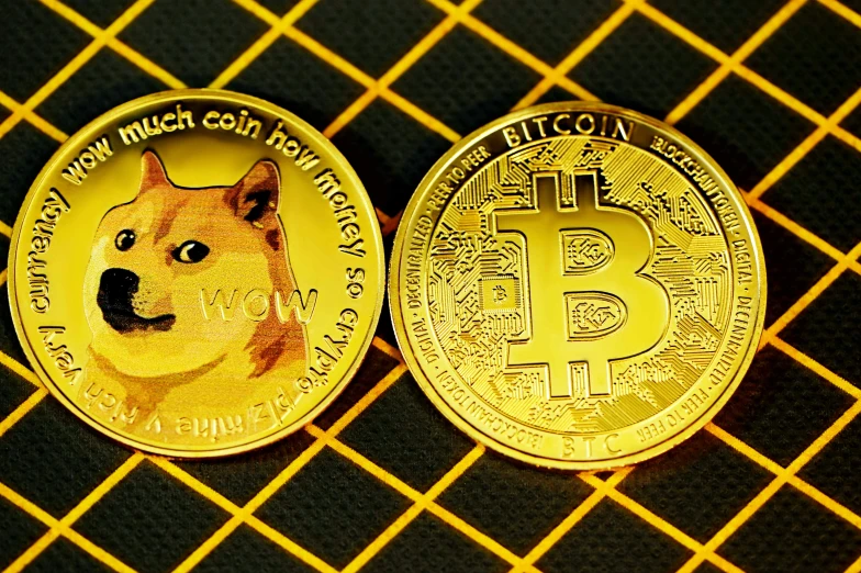 two bitcoins are sitting side by side on the counter