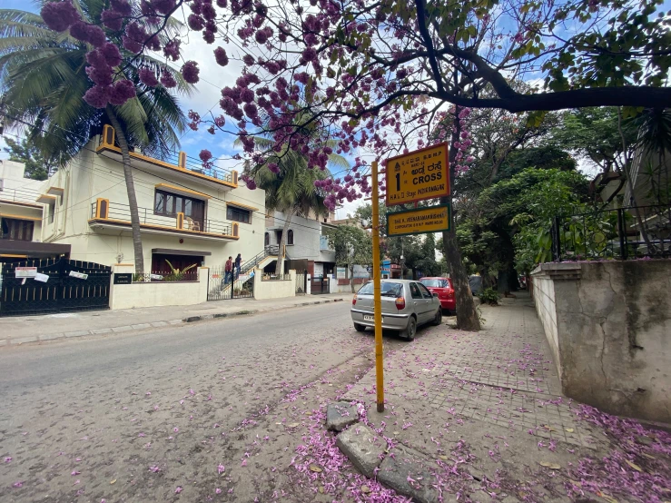 a sign with a bunch of flowers on it