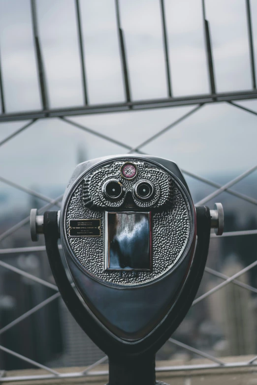 an image of a coin operated meter from a window