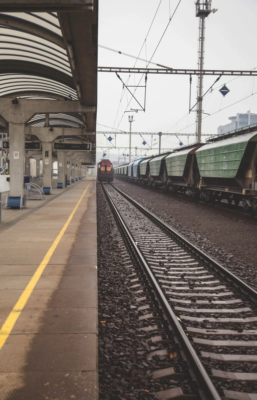 an image of two trains on the tracks