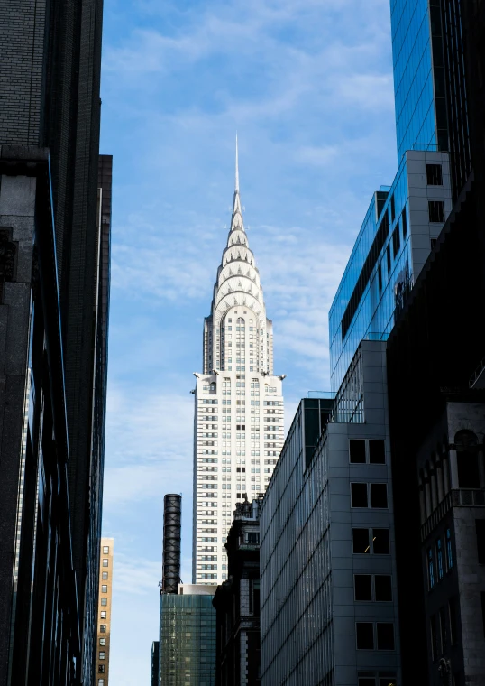 view of a very tall building and its surrounding buildings