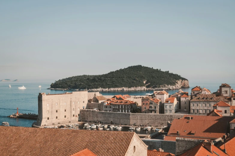 the rooftops of old buildings overlooking the sea