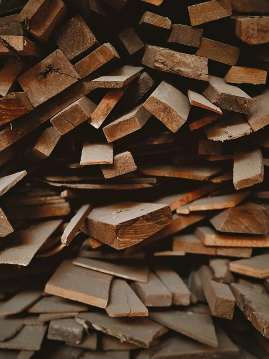 large pile of cut up wooden pieces of wood