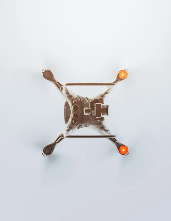 there is an overhead view of a camera, with two light colors
