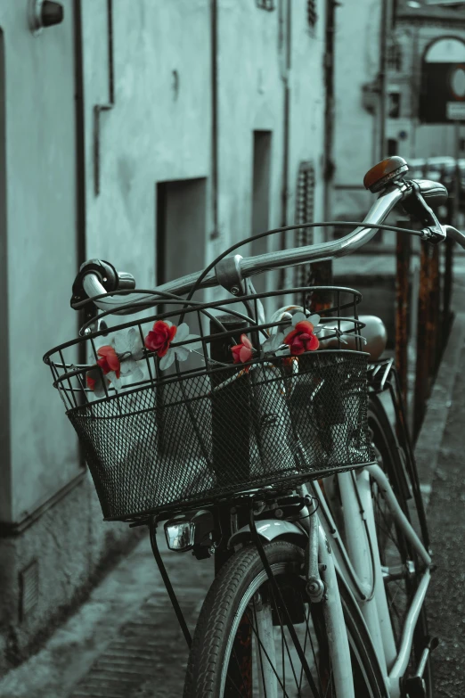 an old - fashioned bike parked on the side of the street in a city