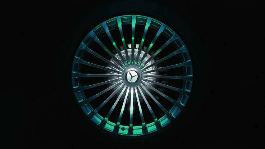 a car wheel wheel with neon lights glowing