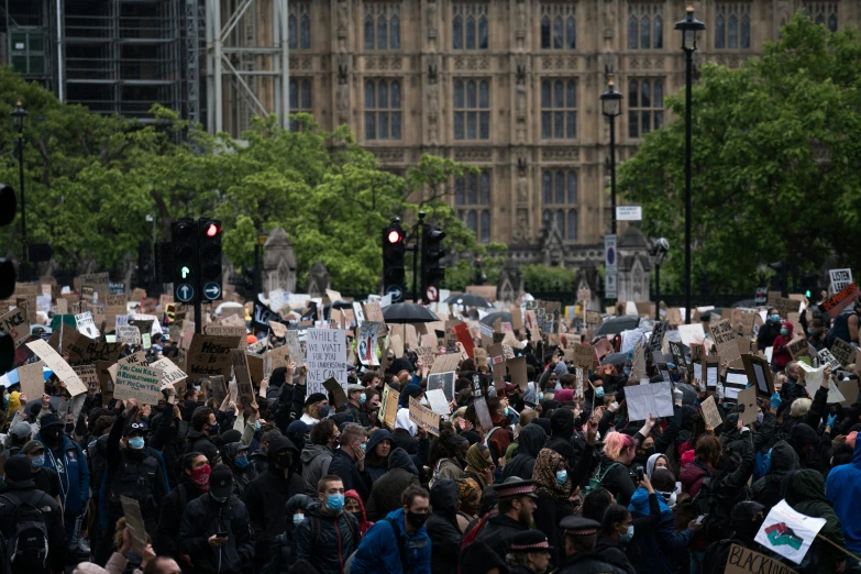 an overhead view of a crowded demonstration outside