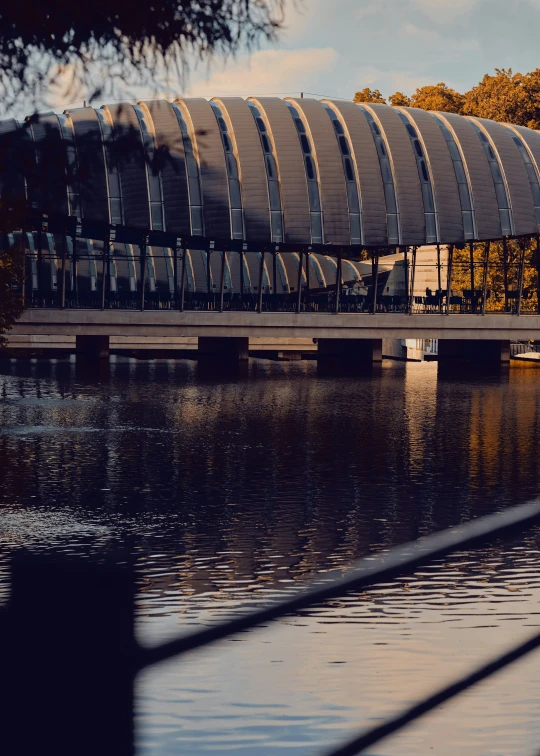 a large pavilion sitting on top of a river