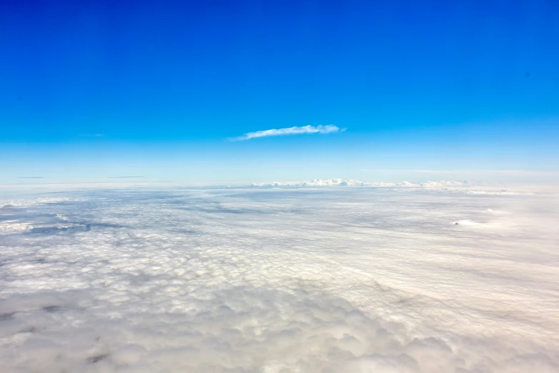 an aerial view of clouds that are visible from the airplane