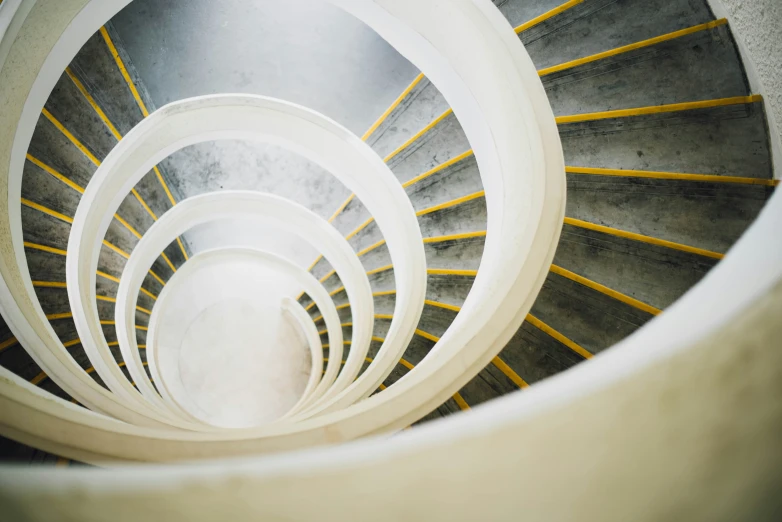 a view down inside a large round staircase